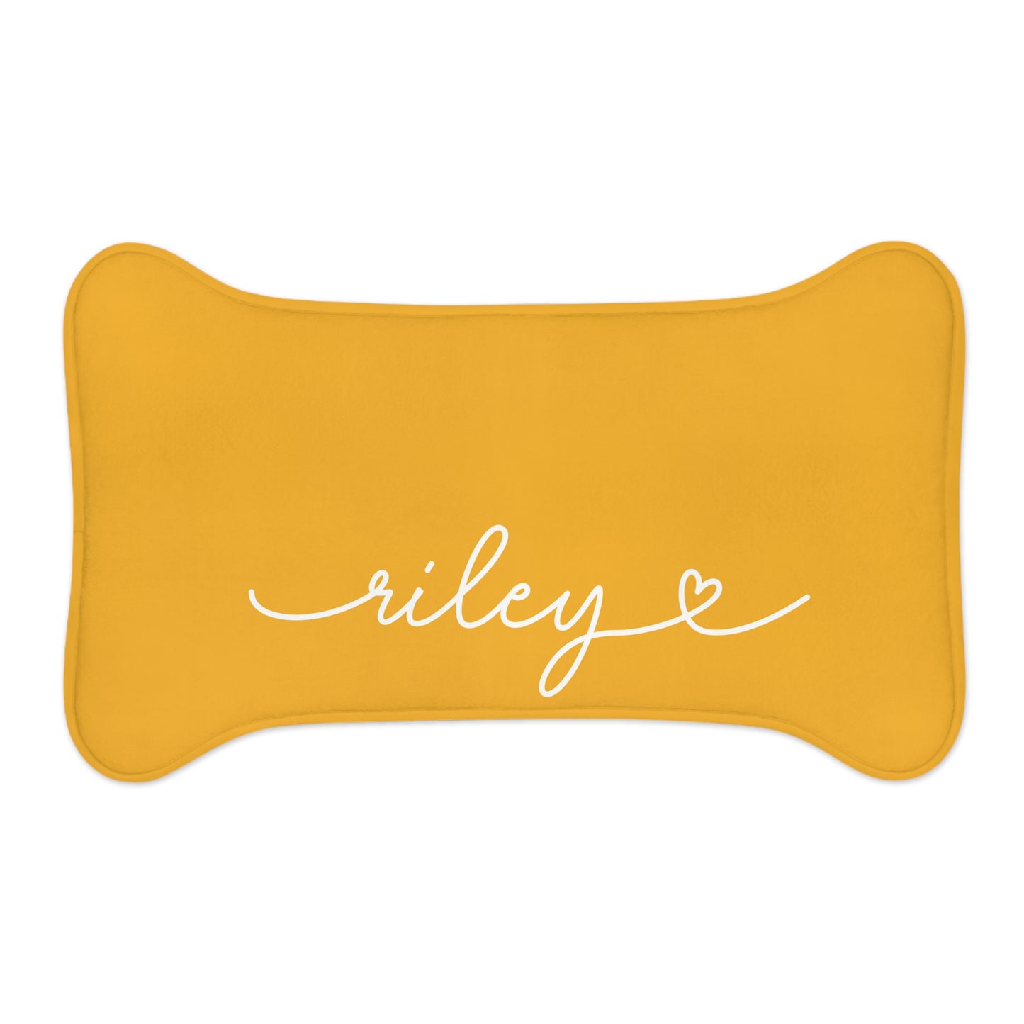 Personalized marigold dog food mat, bone shape, close-up of the handwritten name