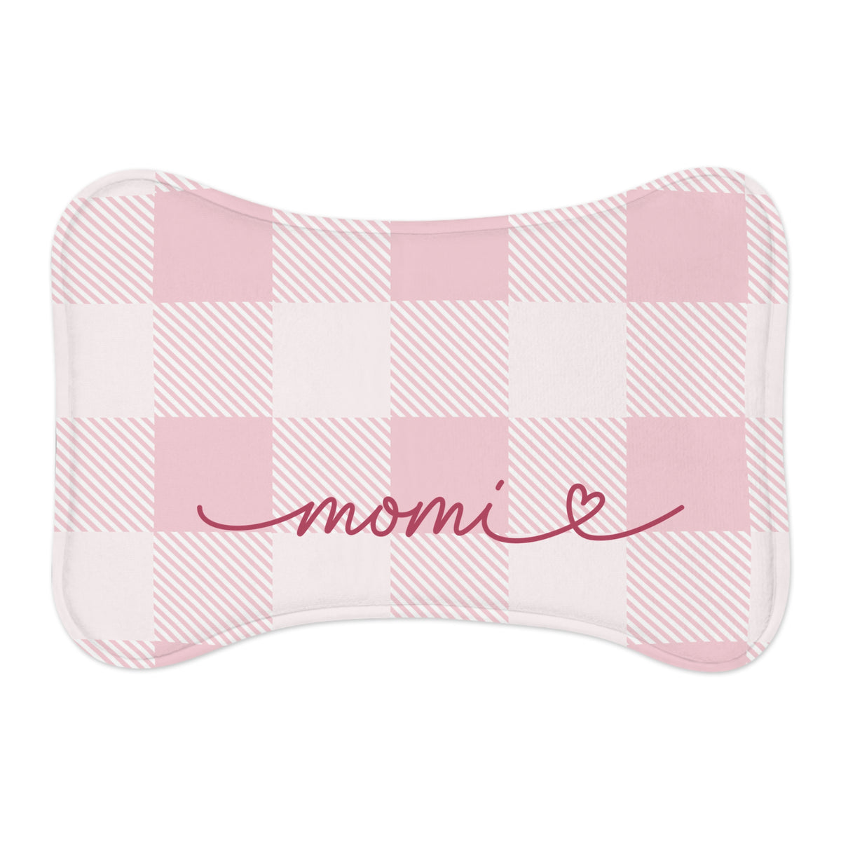 Pink checkered bone-shaped pet feeding mat with a name in red handwritten script and a heart