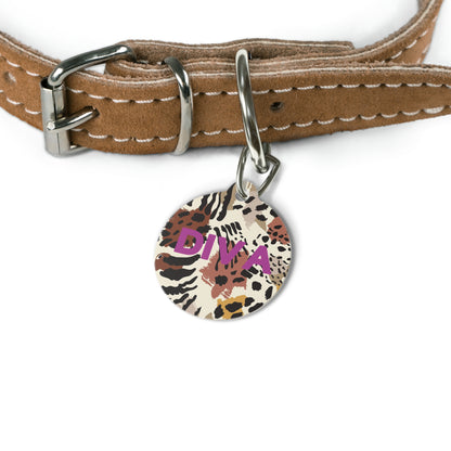 Safari print name tag attached to a tan leather dog collar