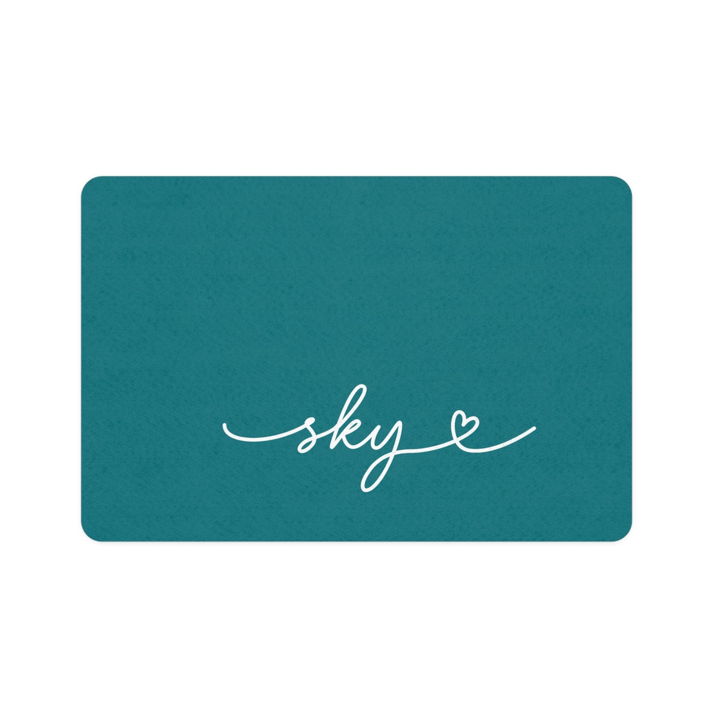 Personalized teal dog food mat with pet name in handwritten script