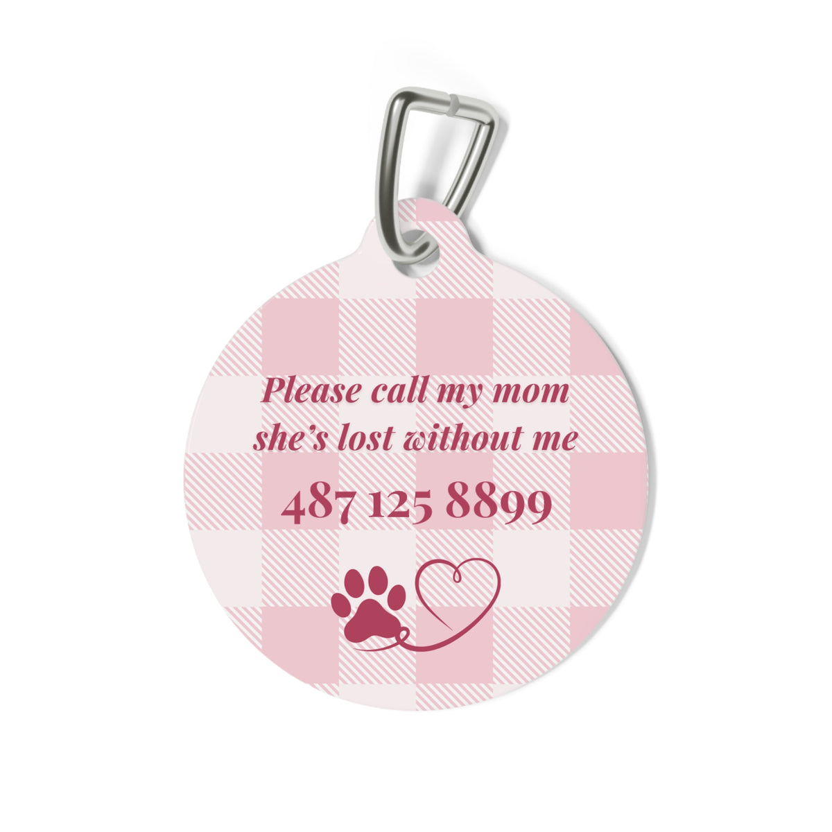 Back of the pink checkered pet tag with printed contact message and a paw print