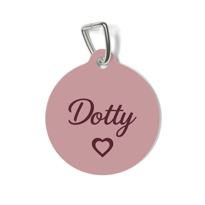 Pink heart personalized pet tag in dusty rose with the name Dotty in burgundy script and an outlined heart