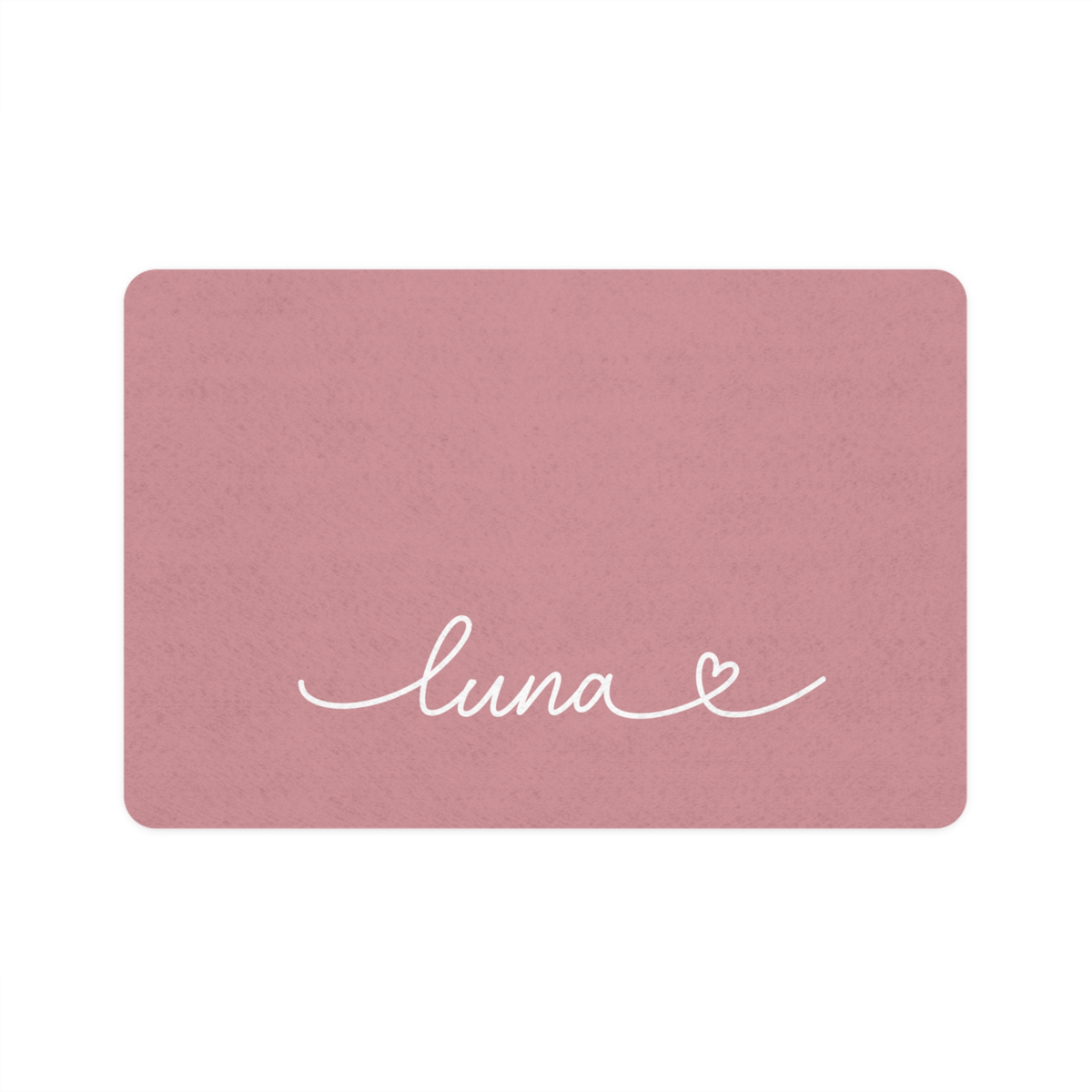 Pink rectangle personalized pet food mat with the name Luna in white handwritten script and a small heart