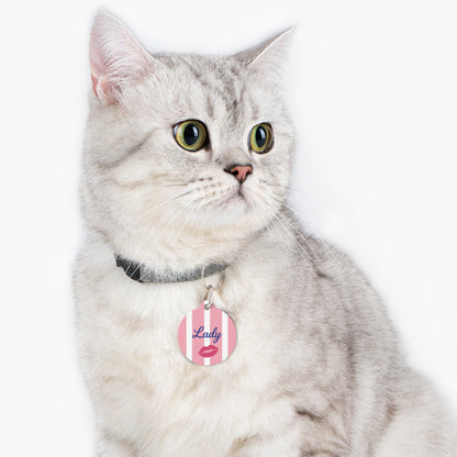 Cat wearing the personalized pink striped name tag