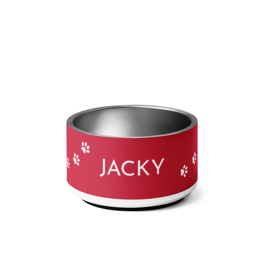 Red personalized dog bowl with the name Jacky in white letters and small white paw prints
