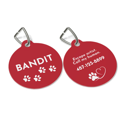 Front and back of red paw print personalized dog tag with name Bandit and Escape artist contact text