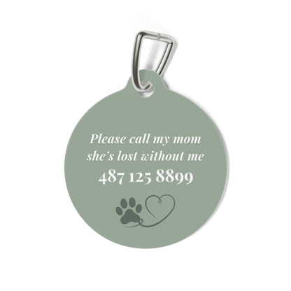 Back of the sage green personalized pet tag with a contact message, phone number and paw print with heart