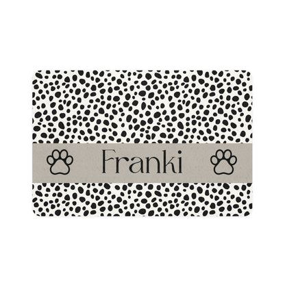 Black spotted personalized pet food mat with a taupe band, the name Franki and two paw prints