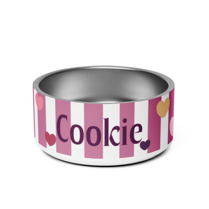 Pink and white striped personalized dog bowl with hearts and the name Cookie in burgundy lettering