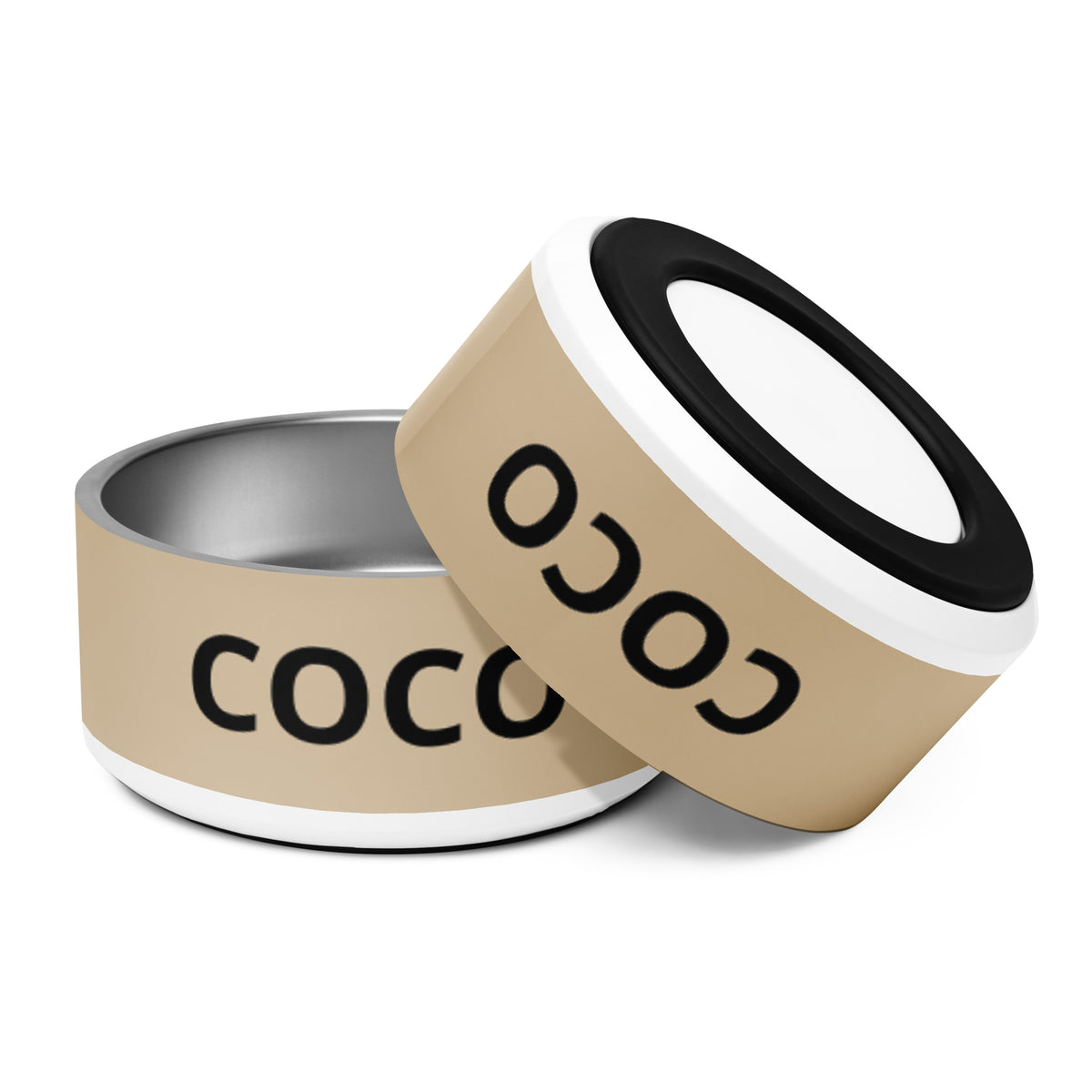 Two large tan modern personalized dog bowls with the name Coco, one tilted to show the rim