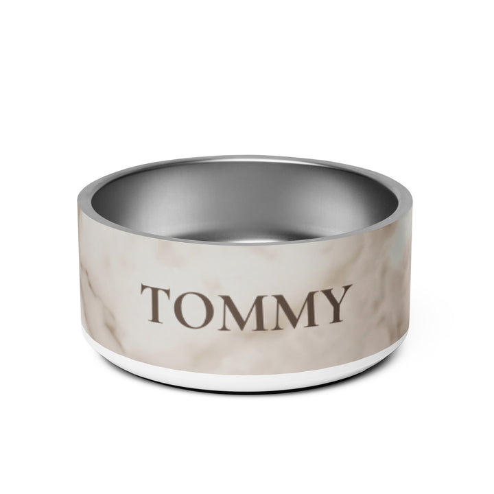 White marble personalized dog bowl with the name Tommy in a classic dark serif, 32 oz stainless steel, front view